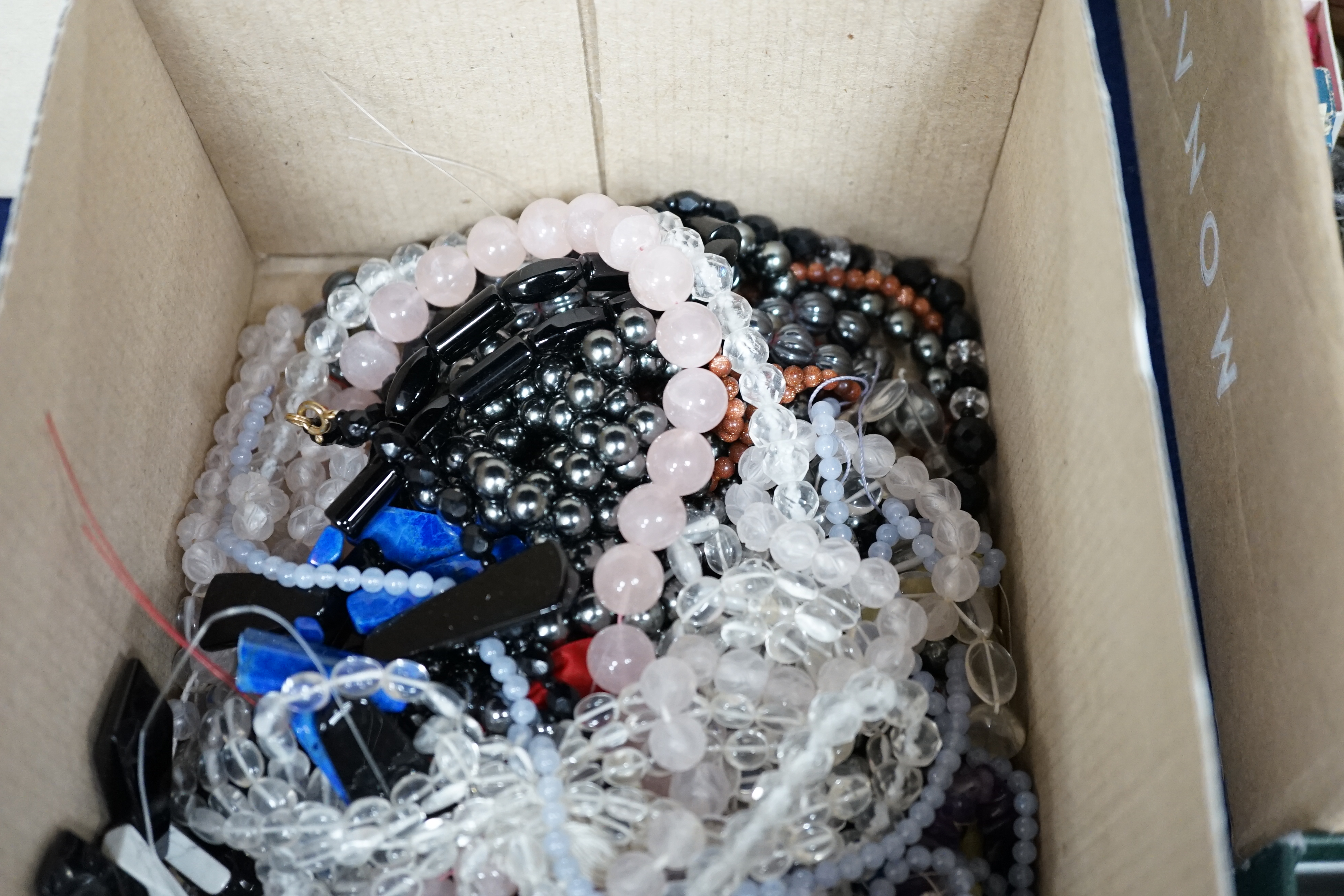 A quantity of assorted mainly modern necklaces, including, coral, amethyst and rose quartz. Condition - fair